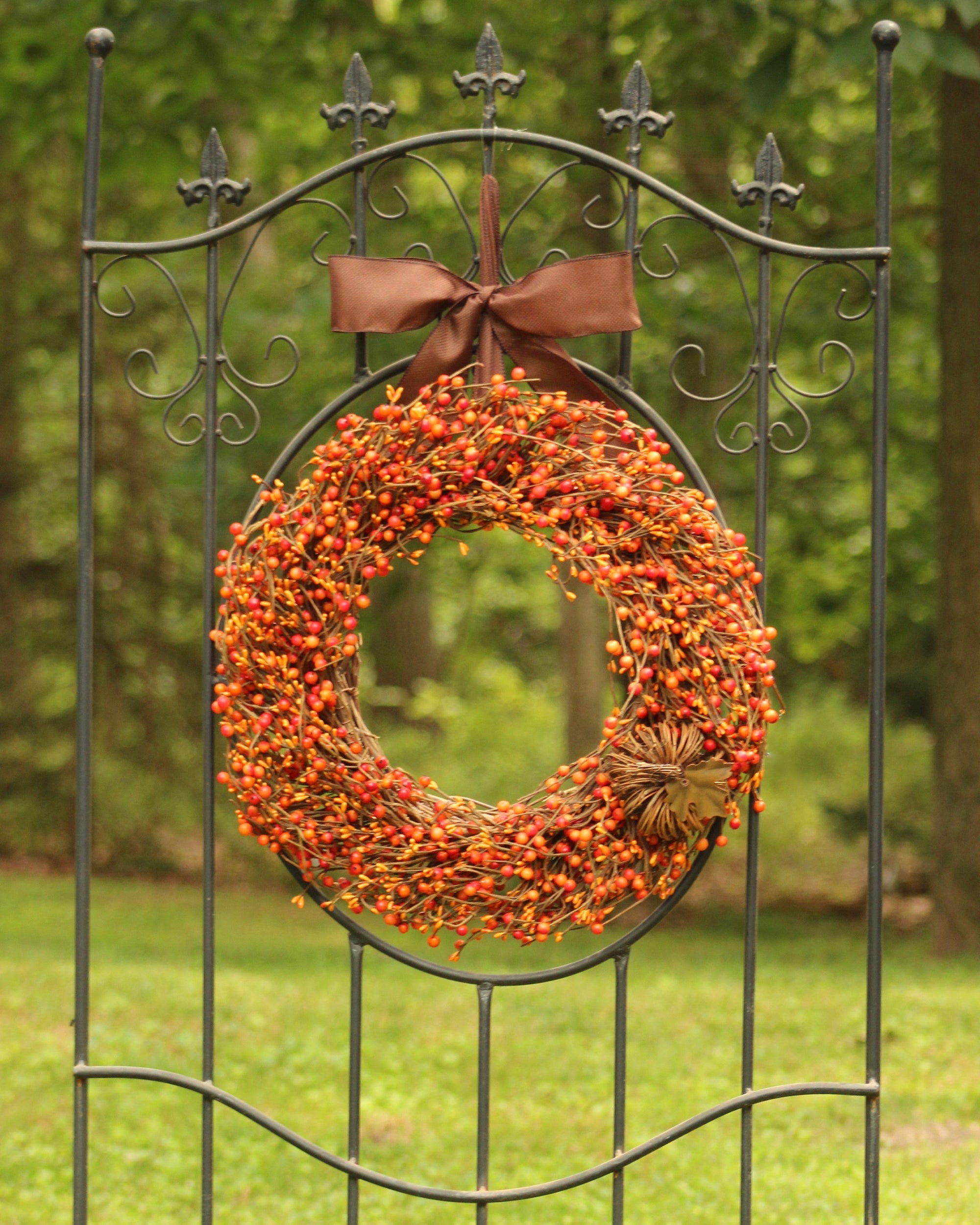 Orange Berry Wreath with Grapevine Pumpkin Bow