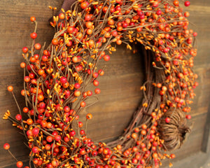Orange Berry Wreath with Grapevine Pumpkin Bow